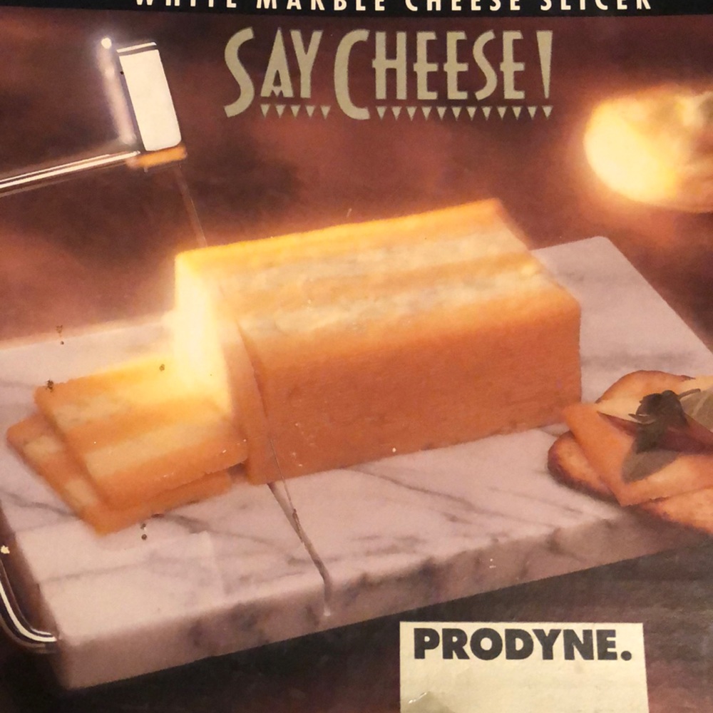 Cheese slicer prodyne